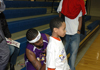 Shonuff signing a shirt for Hoop Magician's fan.